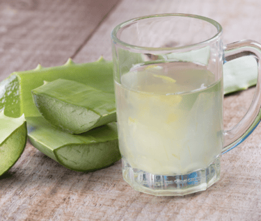 a glass of aloe vera juice 