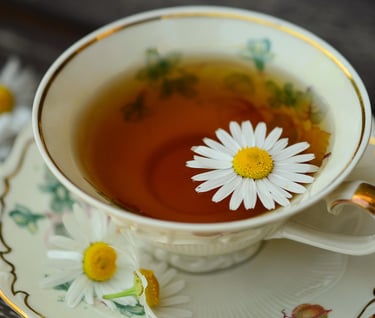 a cup of tea with chamomile use in menopause condition