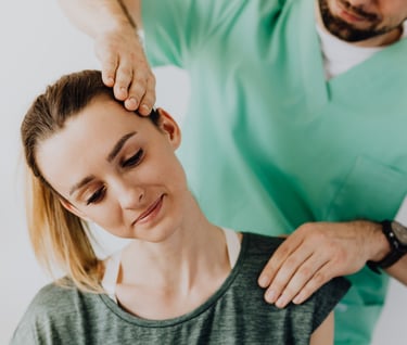 a woman having neck pain due to arthritis