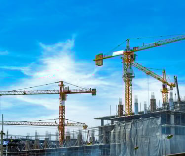 a crane is standing in front of a building
