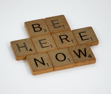 Letter pieces "Be Here Now"