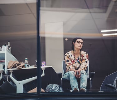 person feeling insecure in office space