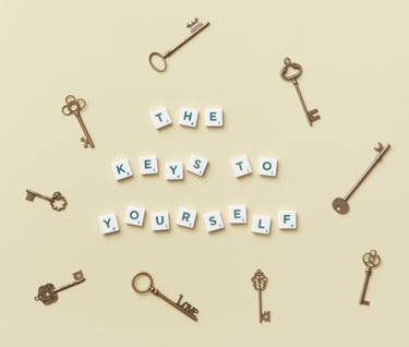 Keys and letter pieces spelling out the "The keys to yourself."