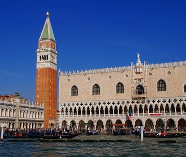 a large building with a clock tower in the middle of it
