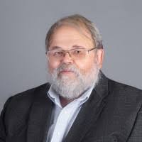 Professional headshot of Alan S. Wicks