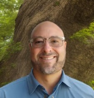 Professional head shot of Tom Frobb