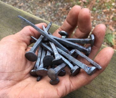 Handful of nails forged by Brenda Posey