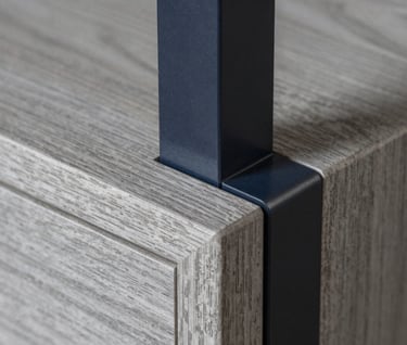 Macro photography of high-quality furniture joints and materials, featuring Soft Gray Blue oak wood texture meeting a Dark Navy metal element. Sharp focus, professional lighting, reflecting Northern European craftsmanship.