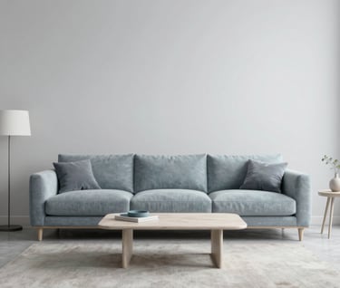 A wide-angle 3D visualization of a minimalist living room with custom-designed furniture. Soft Gray Blue and Pale Mist palette, clean lines, Northern European / Baltic aesthetic, sophisticated lighting.