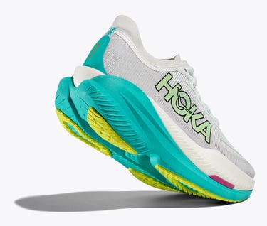 Hoka Mach X 2 running shoe in Frost/Electric Aqua colorway outdoors, showing lightweight upper and rocker profile.