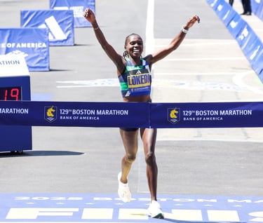Sharon Lokedi celebrating her course record victory at the 2025 Boston Marathon.