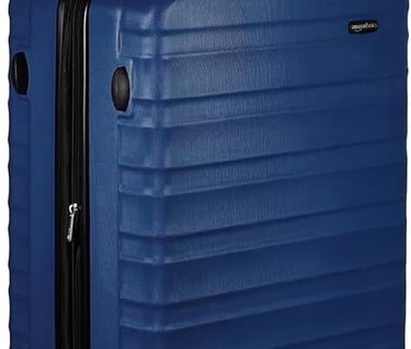 Amazon Basics blue hardside spinner luggage with telescopic handle and 4 wheels.