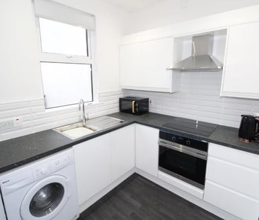 White kitchen with appliances