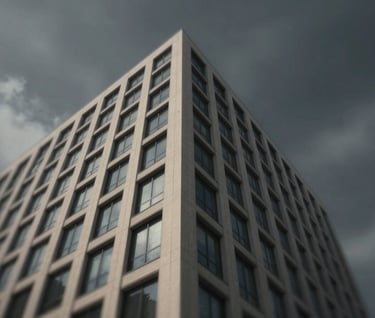 A low-angle, powerful shot of a modern building facade against a dark, moody sky. Strong perspective lines, incorporating #F5F5DC and #1A1A1A. Cinematic and impactful.