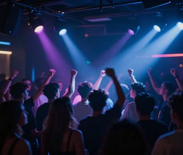 A long exposure shot of a vibrant nightclub dancefloor. Streaks of #7A7CF1 and #E0E0EB light create a sense of high motion and electrifying energy. Sophisticated dark nightlife vibe.