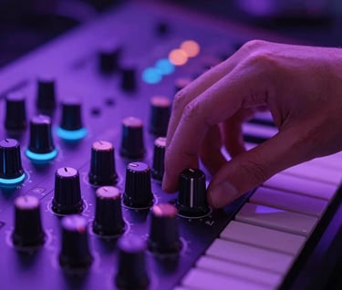 Vertical high-angle shot of a hand adjusting a knob on a synthesizer, vibrant purple lighting reflecting on the gear, modern electronic music production style, #7A7CF1 neon highlights.