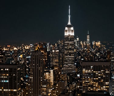 A cinematic night view of a North American city skyline, with skyscrapers glowing against a deep charcoal sky. High-contrast photography with a modern and professional aesthetic.