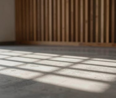 Interior shot of a cultural hall with wooden slats casting intricate shadows on a stone floor, using #D9D2C7 and #2F2E2E, very sophisticated and clean.