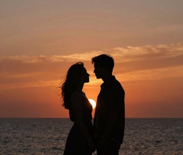 Silhouette of a couple against a Mediterranean sunset, deep anthracite shadows, warm orange and terracotta sky, cinematic composition, emotional storytelling in France.