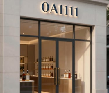 A minimalist architectural exterior shot of a luxury spirits boutique. The glass storefront features a sleek, sophisticated logo in #0A1118. The lighting is early evening, casting soft shadows that highlight the clean lines of the building design.
