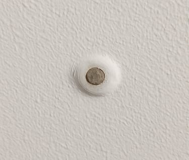 Nail pop in drywall