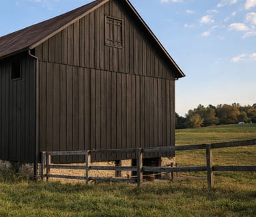 an old barn restored with a rustic matte black color
