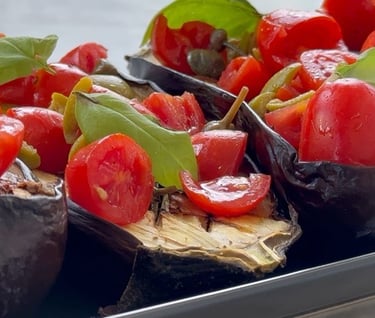 Mediterranean eggplant bruschetta with cherry tomatoes, olives, and capers