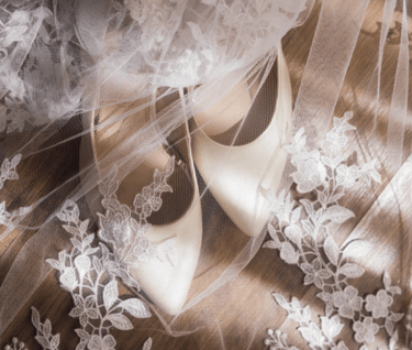 white color heels covers with vail