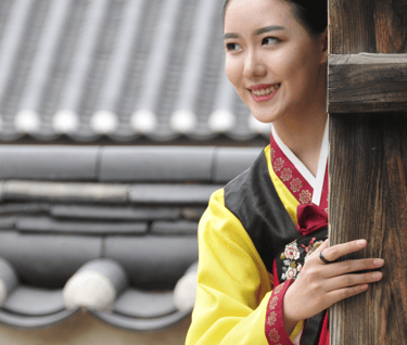 girl standing and smiling 