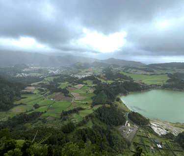 a view of a lake and mountains in the distance