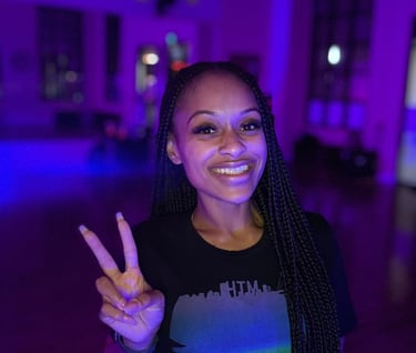 A dancer posing for a photoshoot.