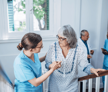 a nurse and a nurse in scrubs