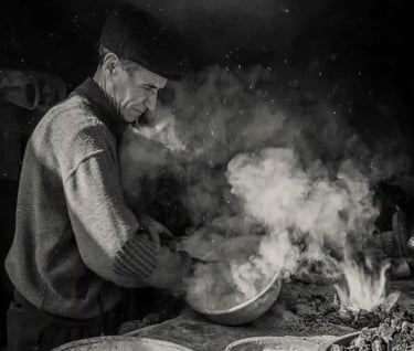A Peruvian man cooking in a seafood restaurant