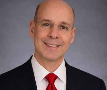 Professional headshot of John Bancroft, Founder / Partner