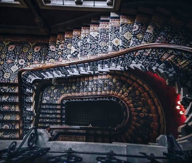 a spiral staircase way with a staircase casement