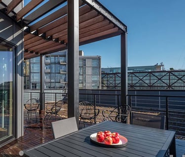A photo of an exterior trellis over a rooftop deck