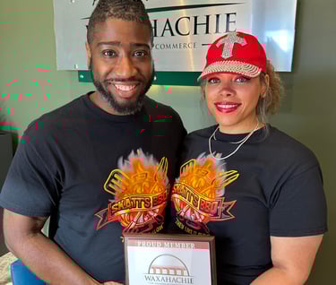 two people holding aframe