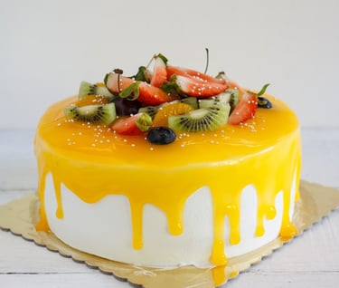 a cake with fruit on top of it