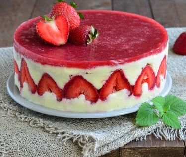 a cake with strawberries and strawberries on a table