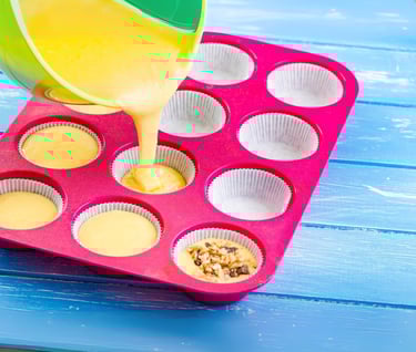 a person pouring batter batter batter batter batter batter batter batter batter batter batter batter batter