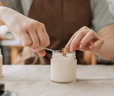 a person is holding a spoon and spoon in their hand