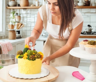 a woman in a white apron and aprons is cutting a cake