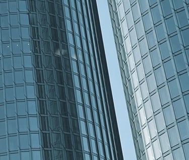 Real estate covered by insurance is depicted using a picture of a building.