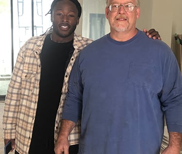 Wayne Dutcher, Founder, with Alvan Kamara