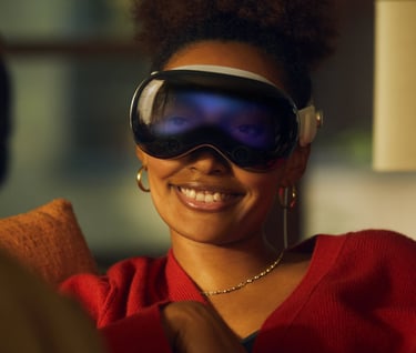a woman wearing a red sweater and Apple VR