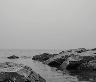 An atmospheric landscape detail focusing on textures of stone and water. Minimalist composition in #AEAEA7 and #6B625E, suggesting a sense of calm and timeless elegance through high-quality visual storytelling.