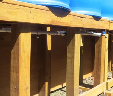 Pipe connecting the water barrels