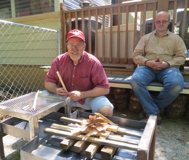 Two men at the fire pit