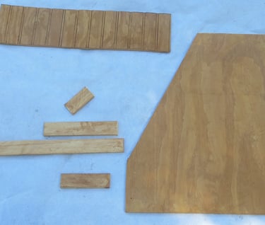Cut and stained pieces of wood
