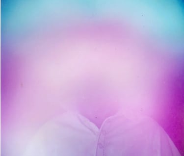 Bruce Clifton surrounded by a pink, white, green, blue and white Aura. Spiritual evidence of talent